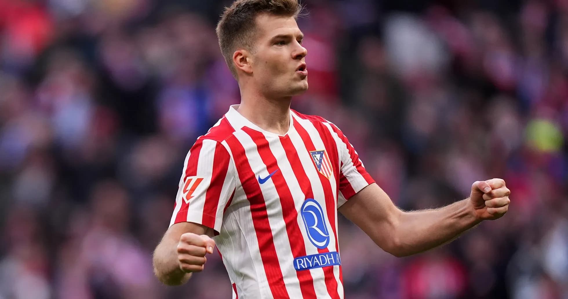 Atletico Madrid player celebrating during match Atletico Madrid player celebrating during match