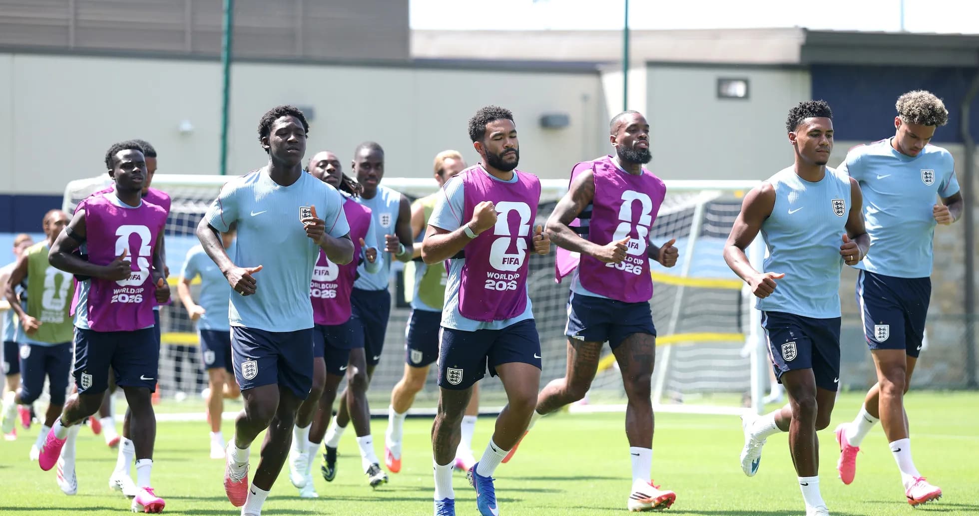 England team members jogging during training session England team members jogging during training session