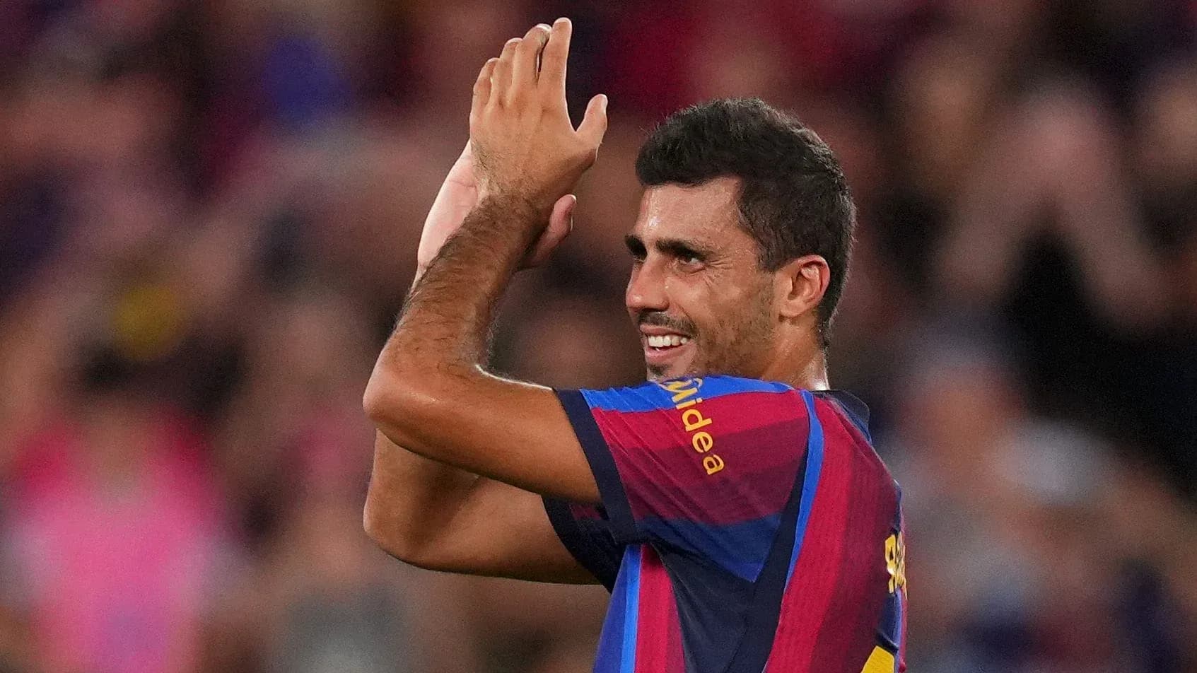 Player applauding fans during match at stadium Player applauding fans during match at stadium