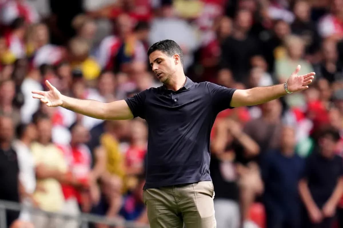 Coach gesturing towards crowd during match Coach gesturing towards crowd during match
