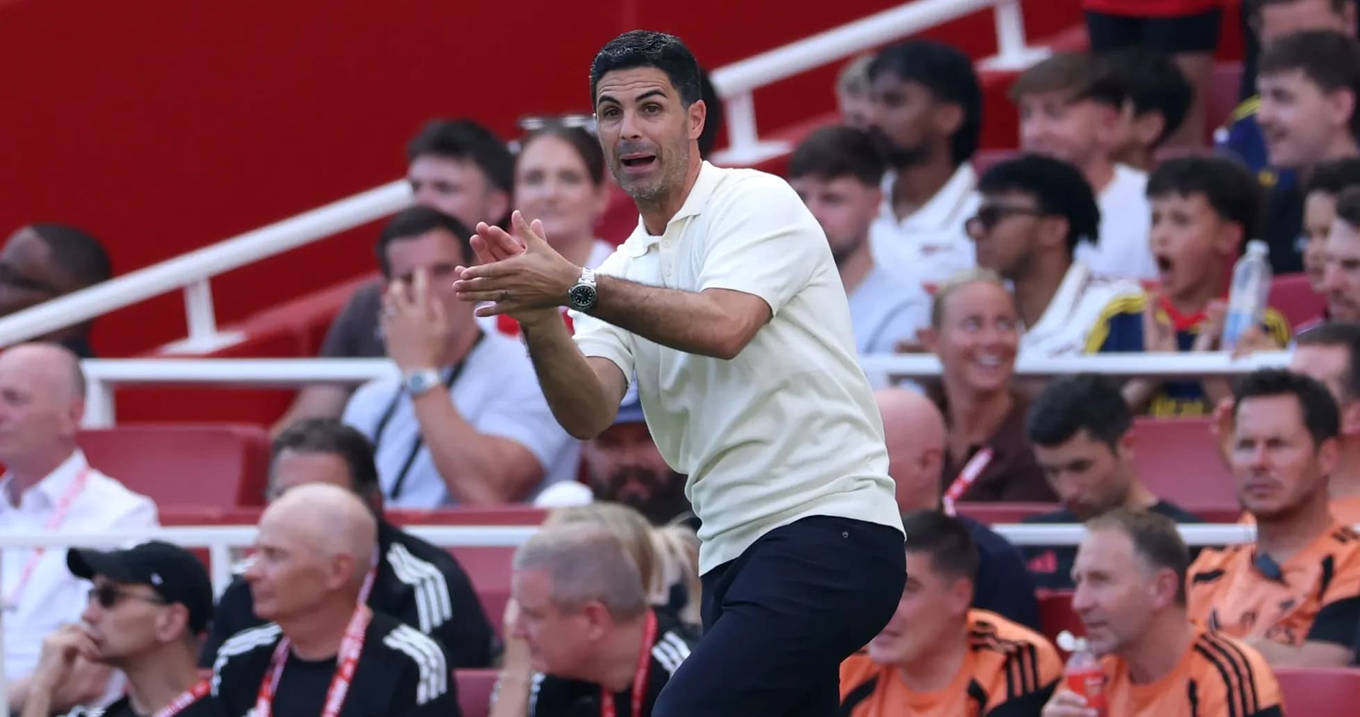 Manager gesturing on the sidelines during match Manager gesturing on the sidelines during match
