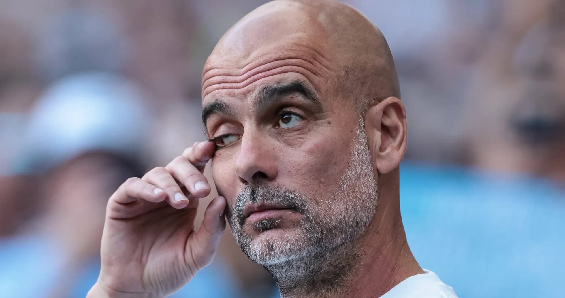 Coach with a focused expression during match Coach with a focused expression during match