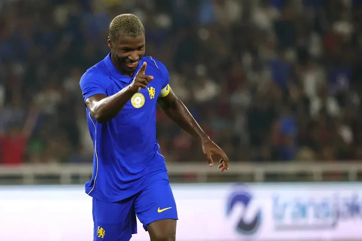 Player celebrating goal during match in blue kit Player celebrating goal during match in blue kit