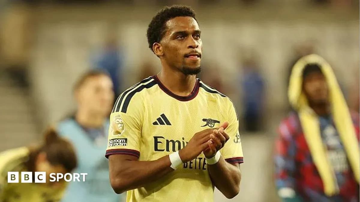 Player applauding fans after match in yellow kit Player applauding fans after match in yellow kit