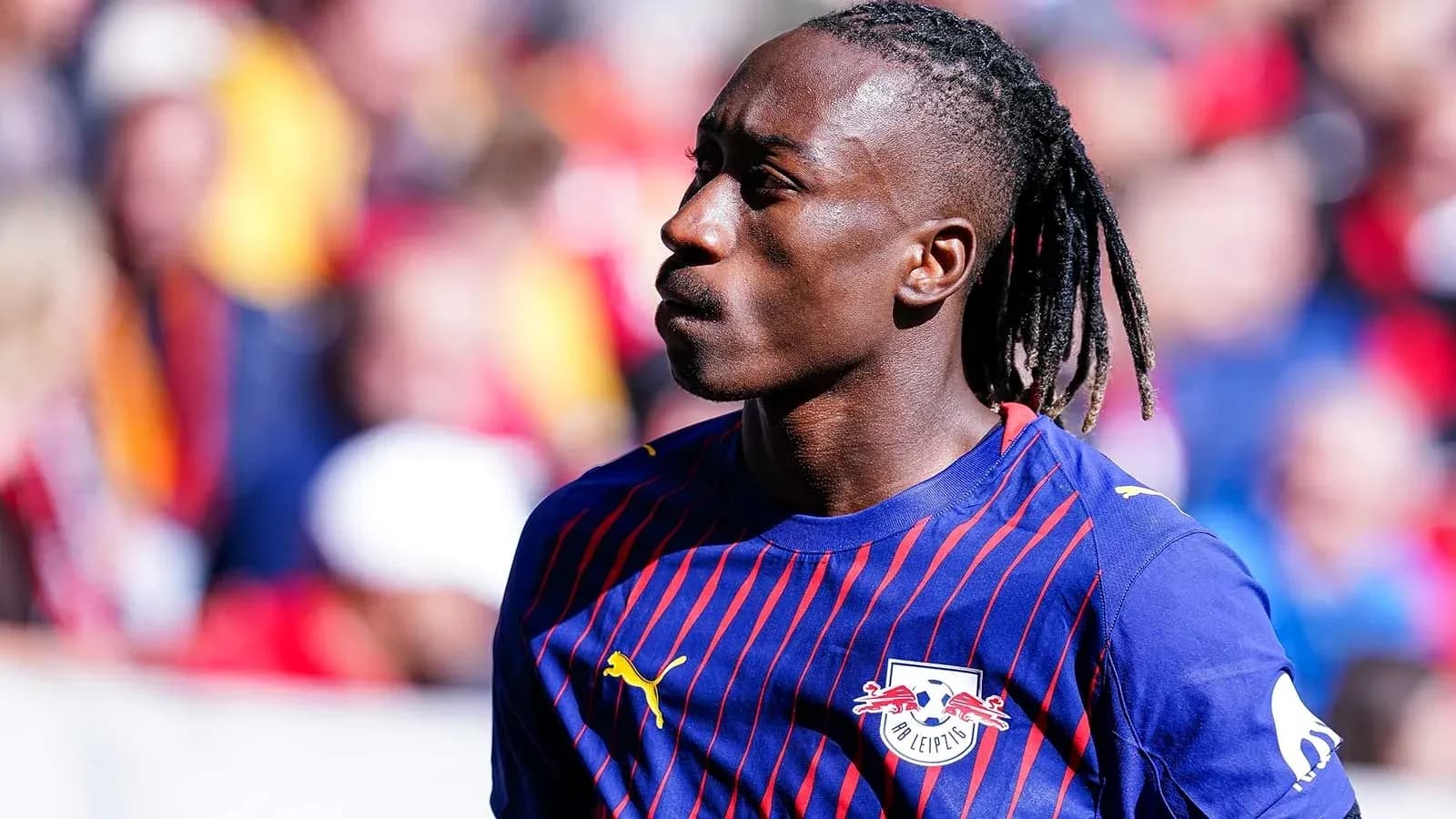 Player wearing RB Leipzig jersey on the pitch Player wearing RB Leipzig jersey on the pitch