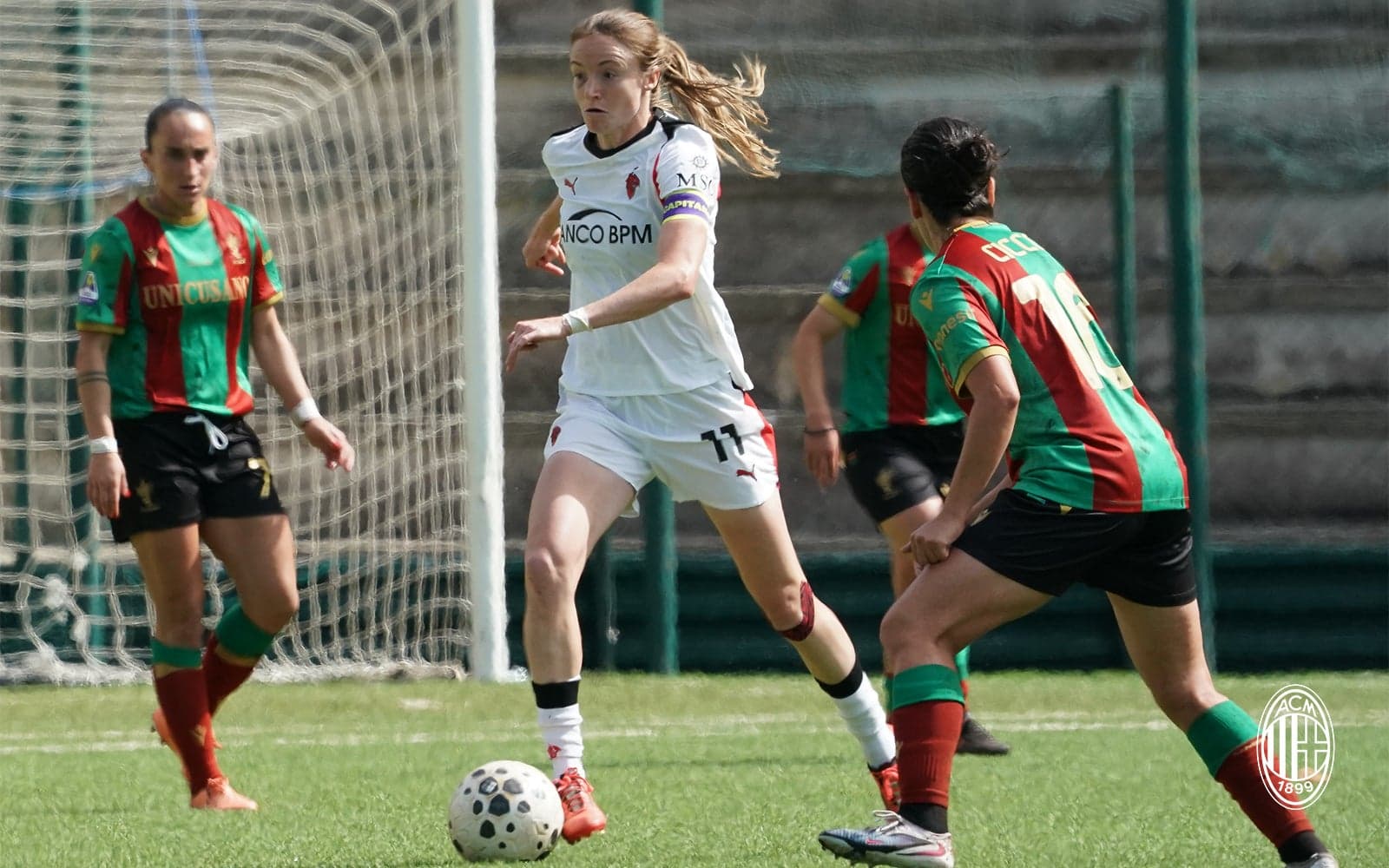 Ternana W player dribbling past AC Milan W opponent Ternana W player dribbling past AC Milan W opponent