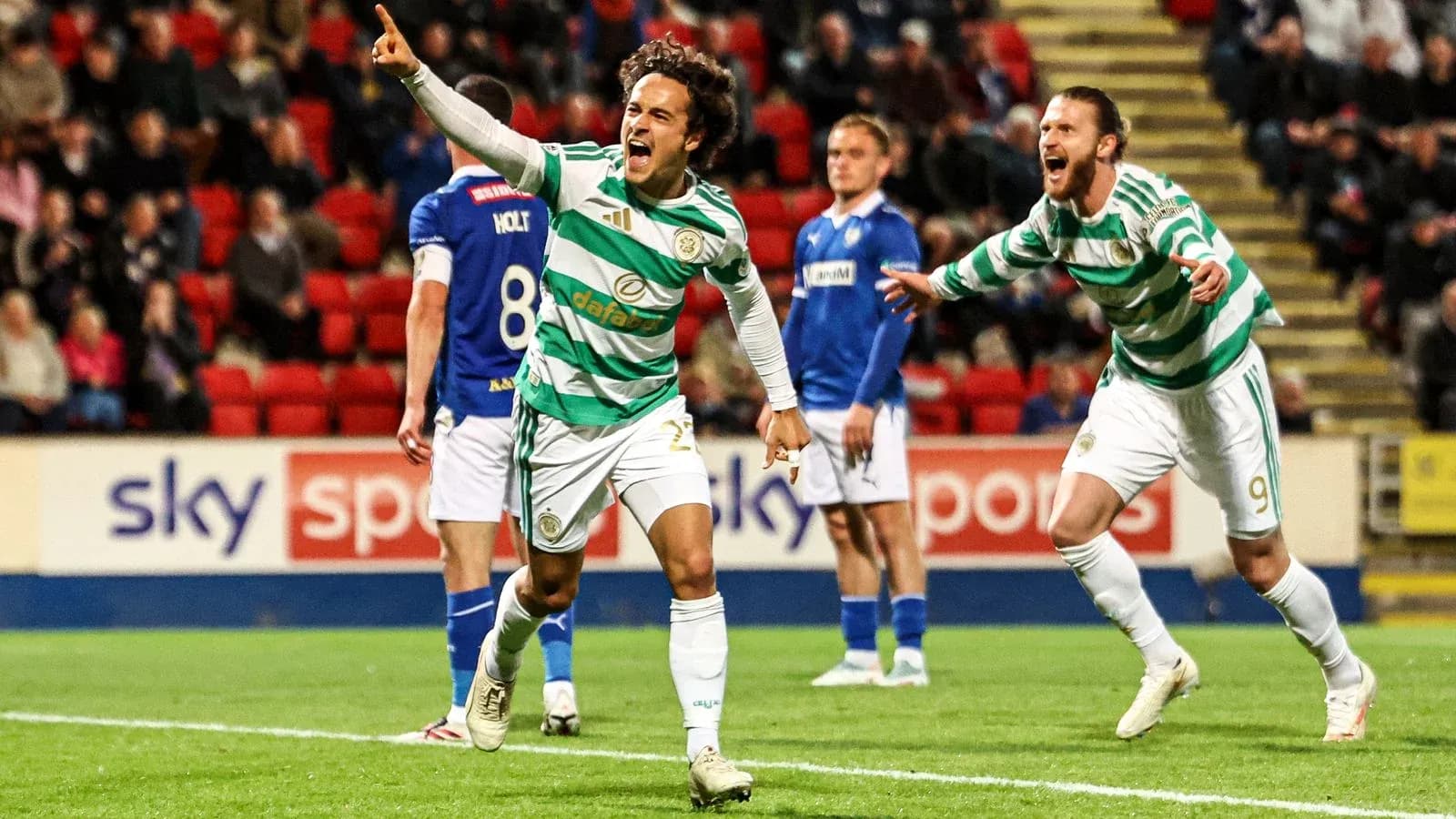 Celtic players celebrating a goal during match Celtic players celebrating a goal during match