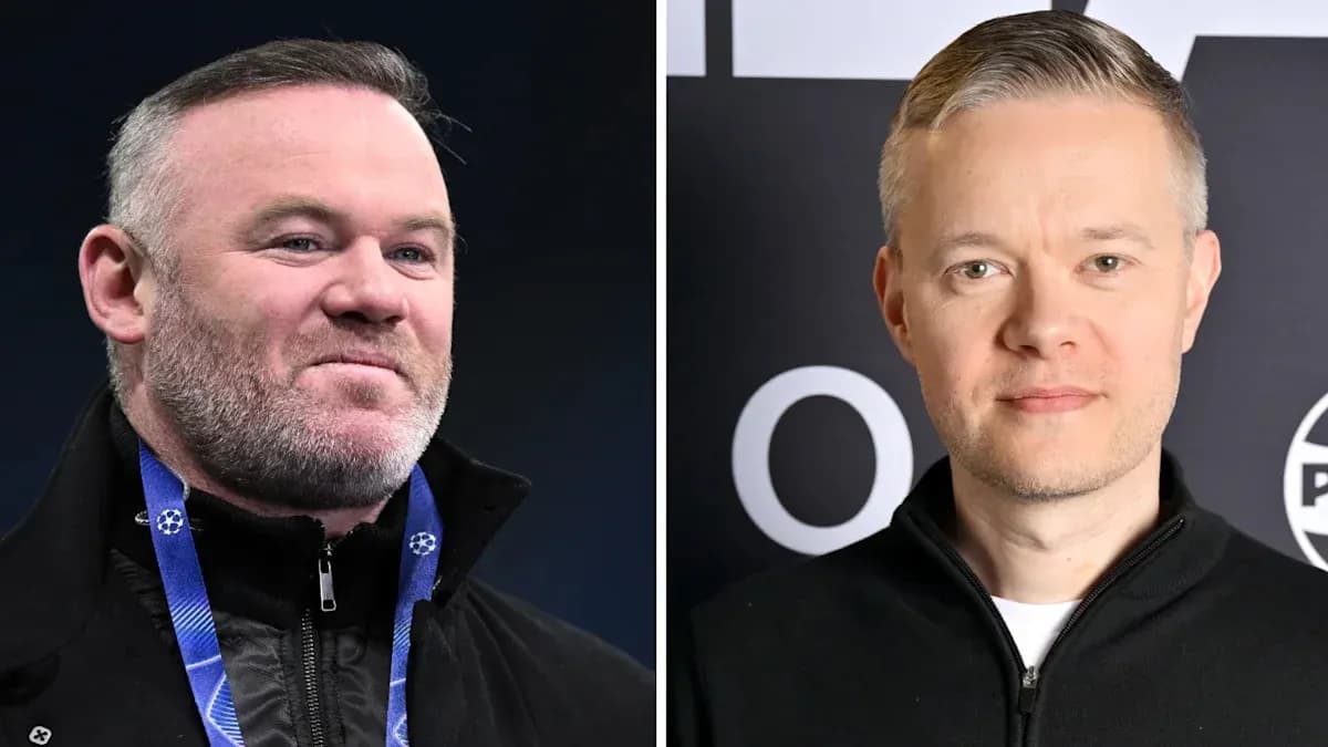 Two men posing for a portrait in black jackets Two men posing for a portrait in black jackets