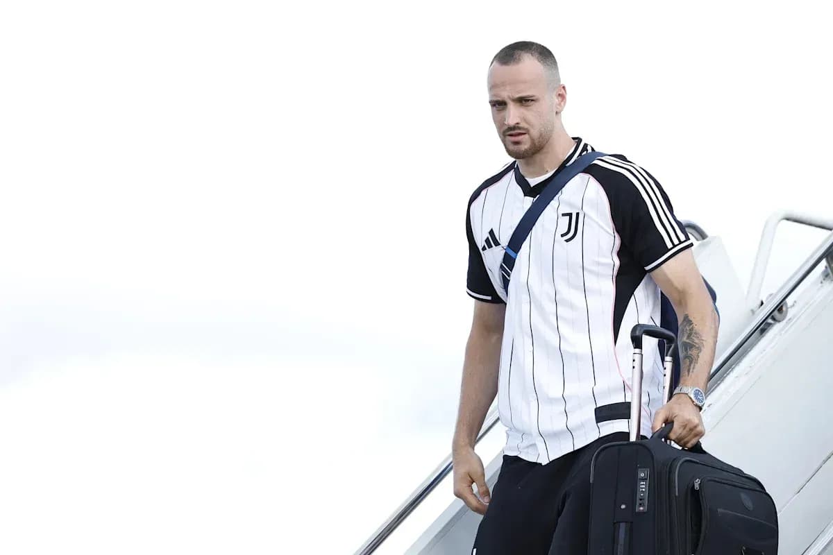 Player arriving with luggage after flight Player arriving with luggage after flight