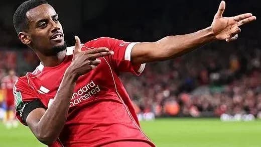 Player celebrating a goal on the pitch Player celebrating a goal on the pitch