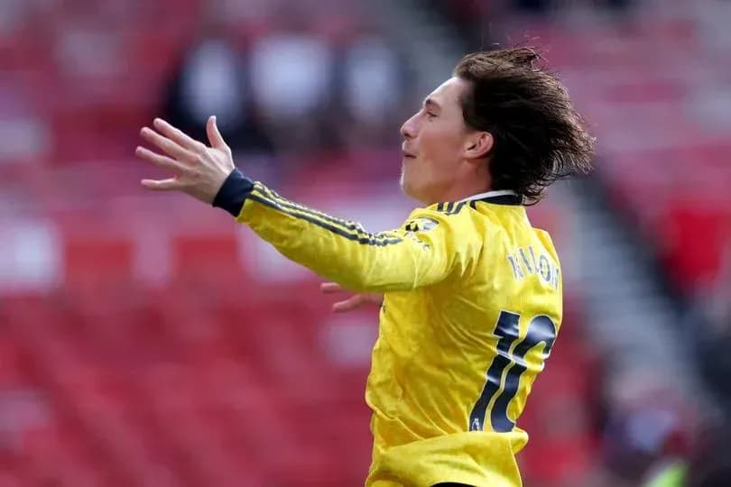 Player celebrating after scoring a goal Player celebrating after scoring a goal