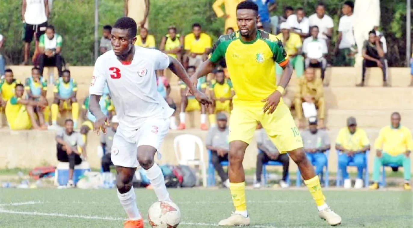 Player dribbling the ball during NPFL match Player dribbling the ball during NPFL match