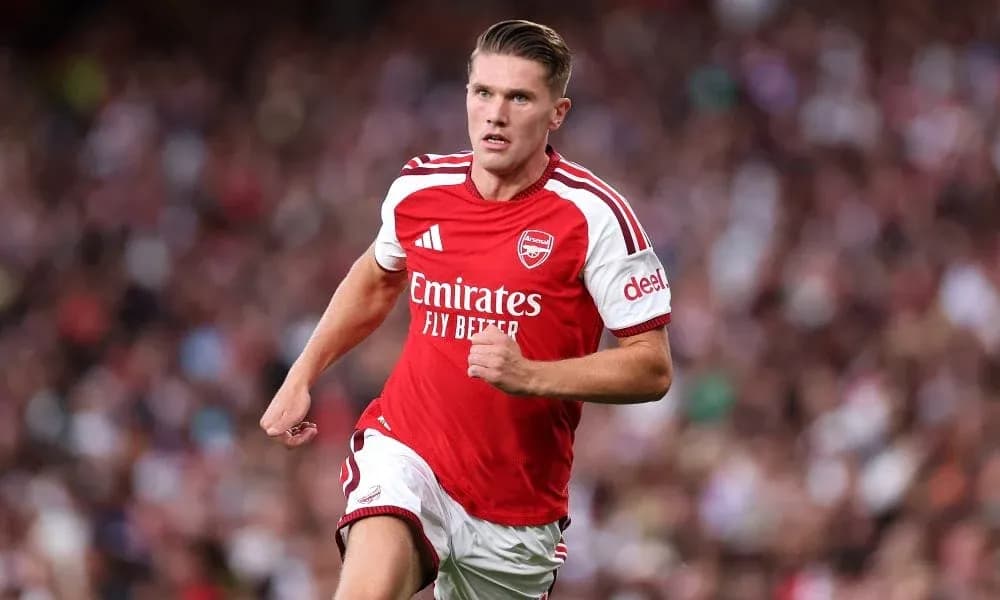 Player running during a match for Arsenal Player running during a match for Arsenal