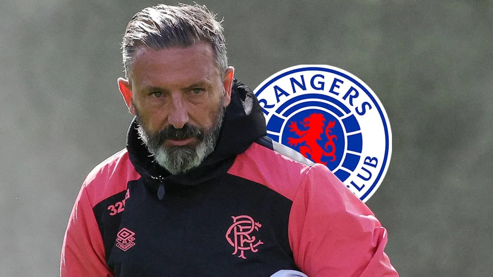 Football coach in training gear with Rangers logo Football coach in training gear with Rangers logo
