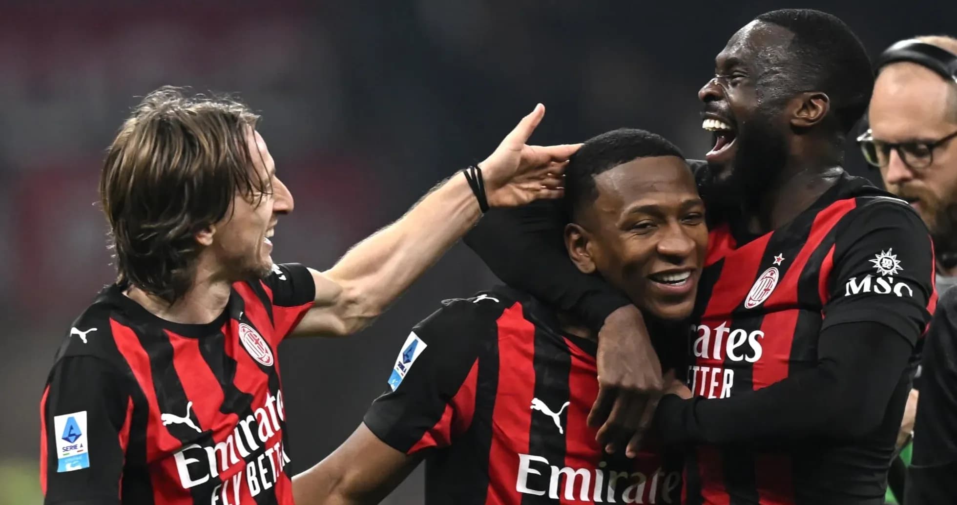 AC Milan players celebrating a goal AC Milan players celebrating a goal