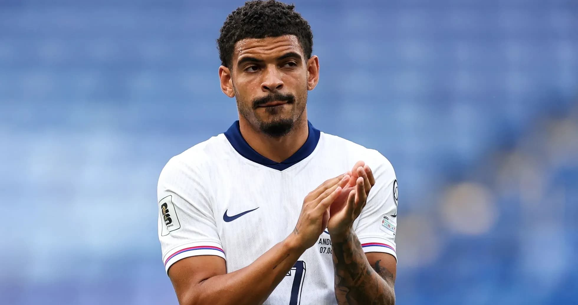 Player applauding on the field after match Player applauding on the field after match