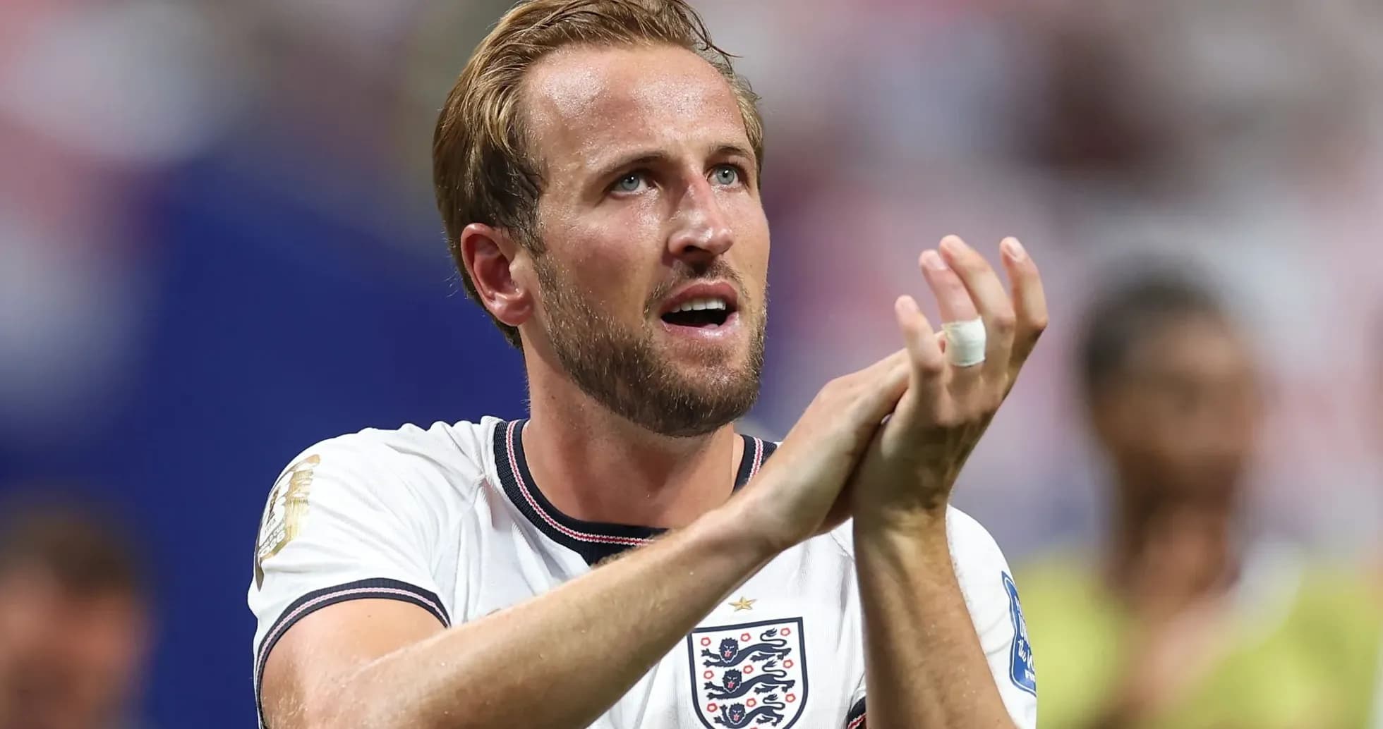 Player clapping during match celebration wearing England jersey Player clapping during match celebration wearing England jersey