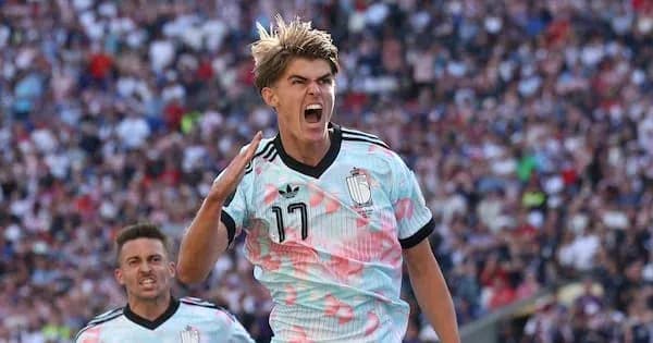 Player celebrating after scoring a goal Player celebrating after scoring a goal