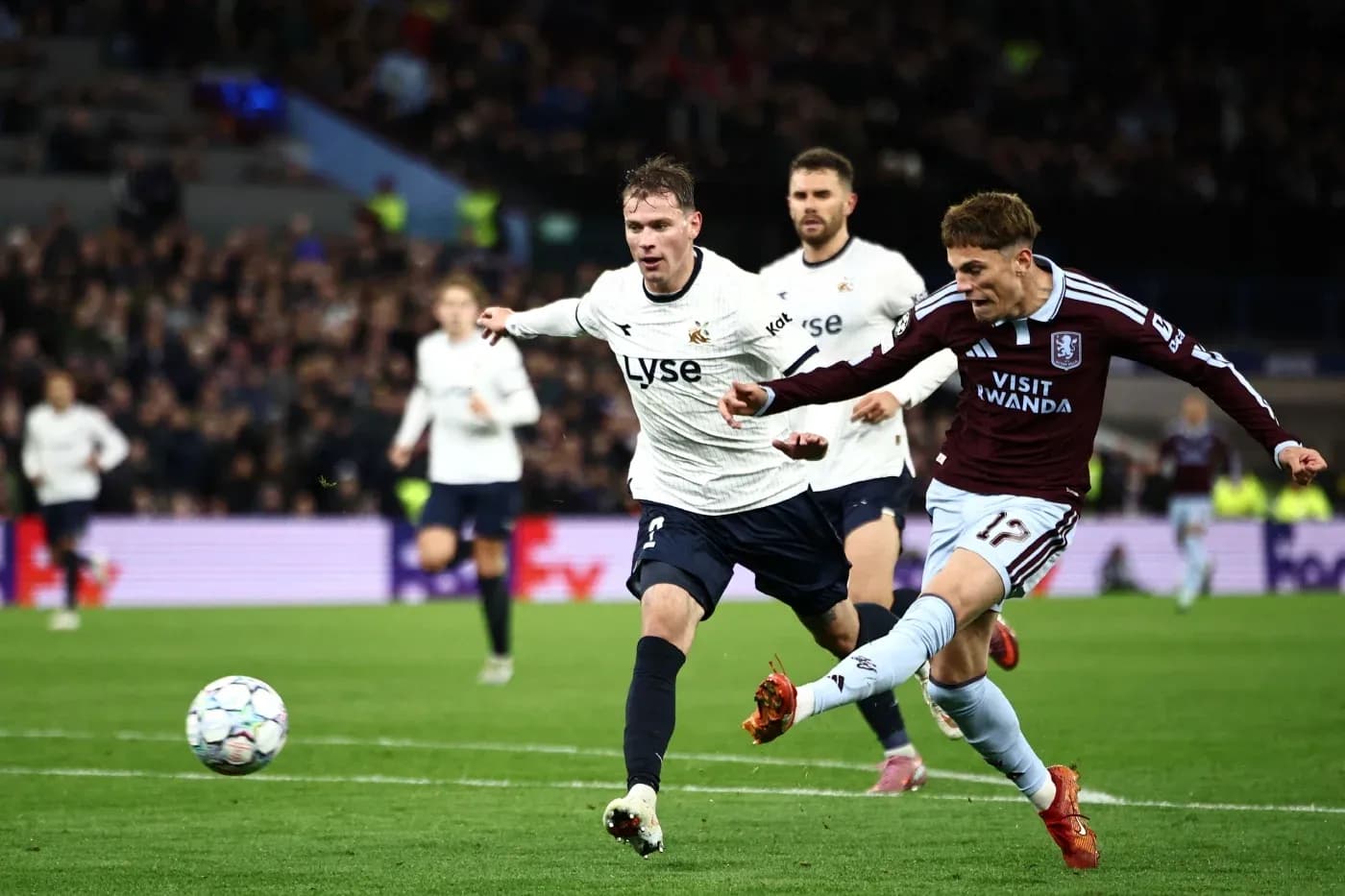 Aston Villa player tackling Viking opponent Aston Villa player tackling Viking opponent