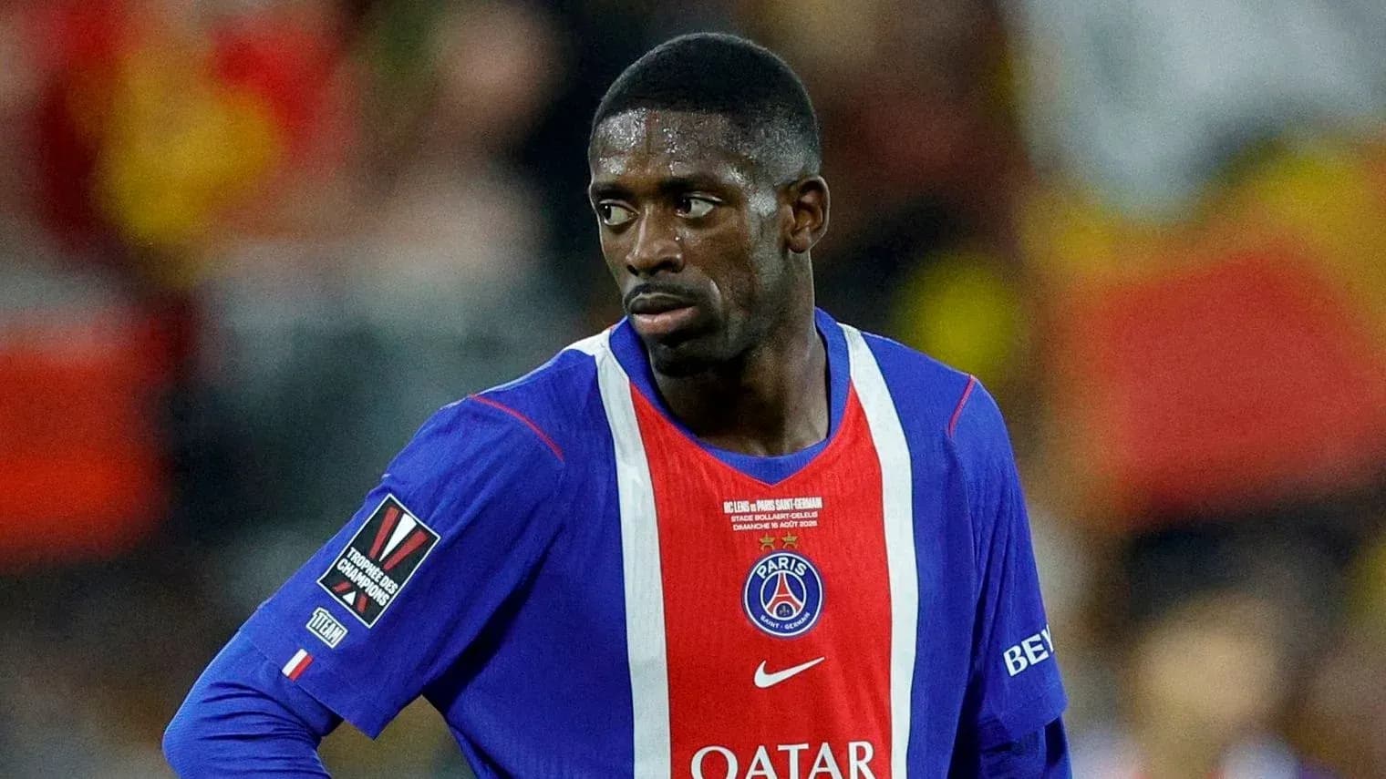 Player in PSG jersey during a match Player in PSG jersey during a match