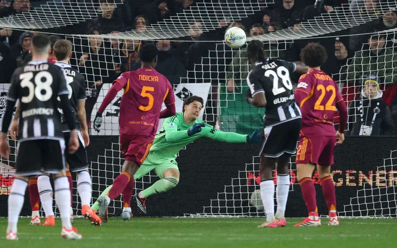 Goalkeeper diving to save a penalty kick Goalkeeper diving to save a penalty kick