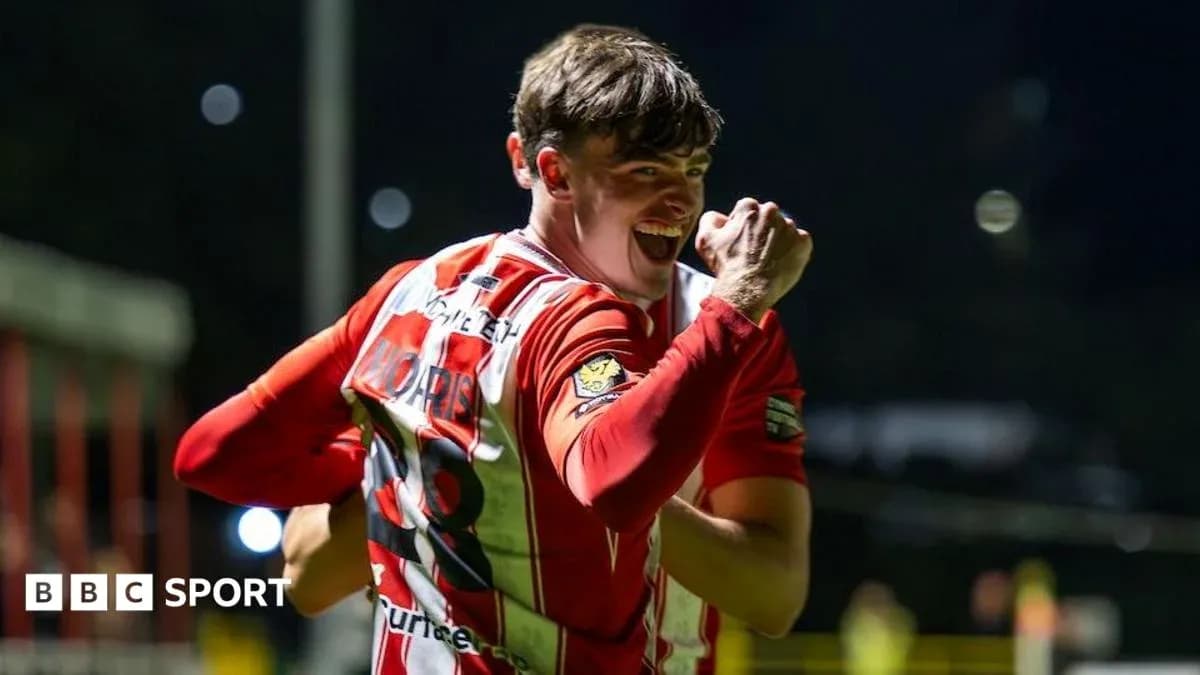 Player celebrating a goal with clenched fist Player celebrating a goal with clenched fist