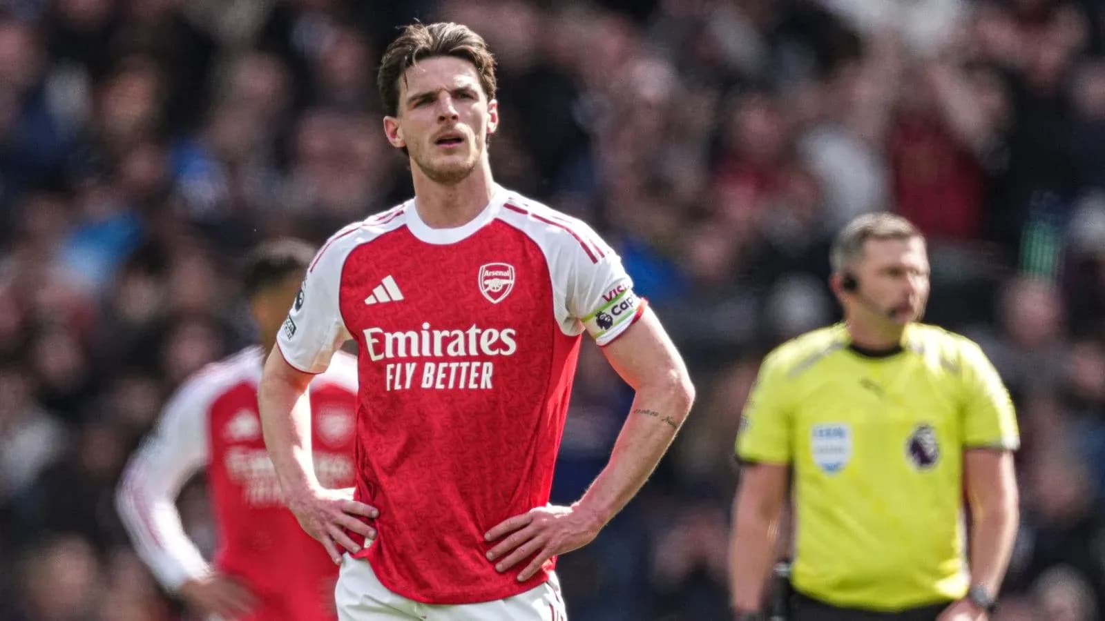 Arsenal player looking disappointed during match Arsenal player looking disappointed during match