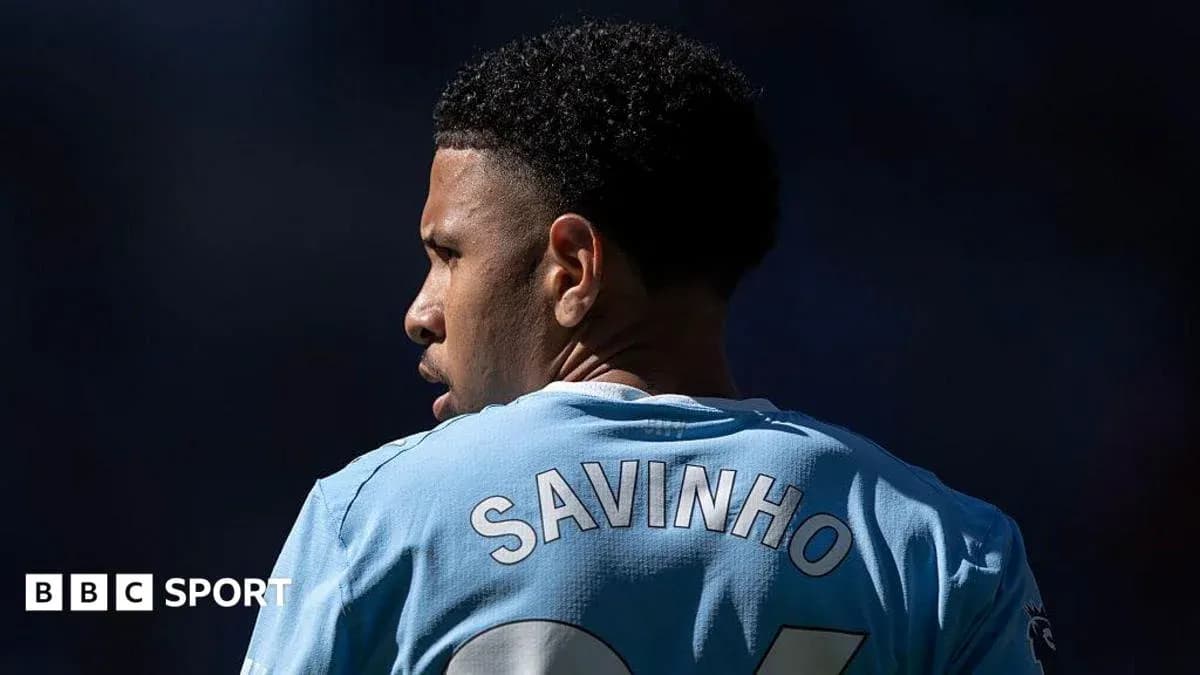 Player wearing jersey with 'SAVINHO' on back Player wearing jersey with 'SAVINHO' on back