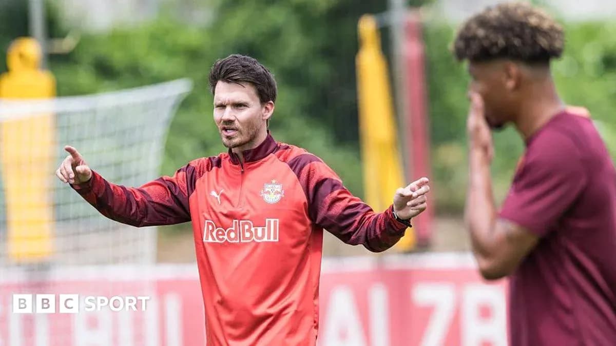 Coach giving instructions during training session Coach giving instructions during training session