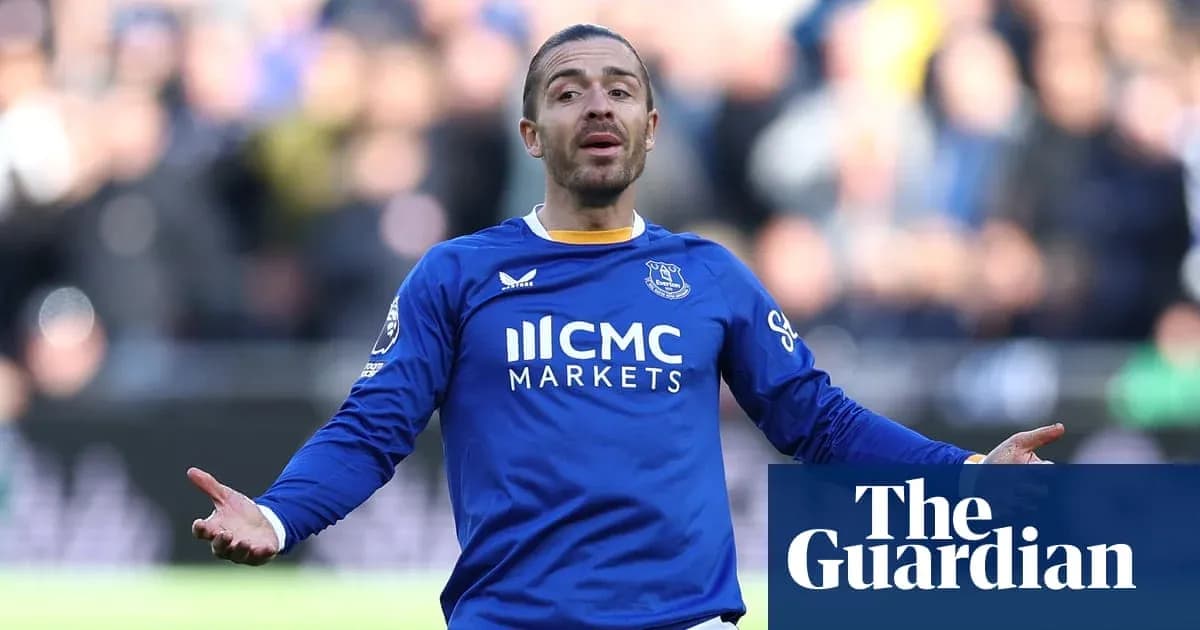 Player gesturing during a football match for Everton Player gesturing during a football match for Everton