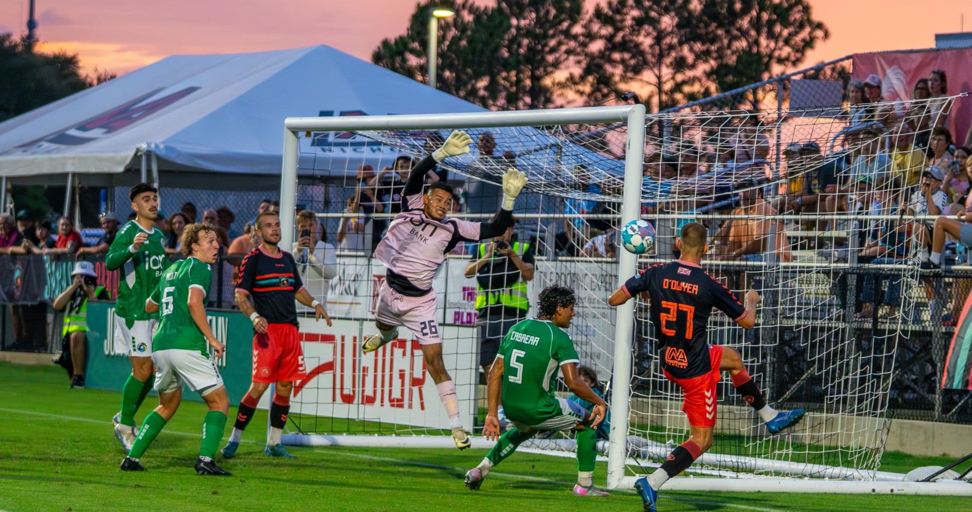 Goalkeeper making a save during match Goalkeeper making a save during match