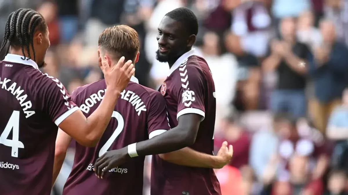 Hearts players celebrating during a match Hearts players celebrating during a match