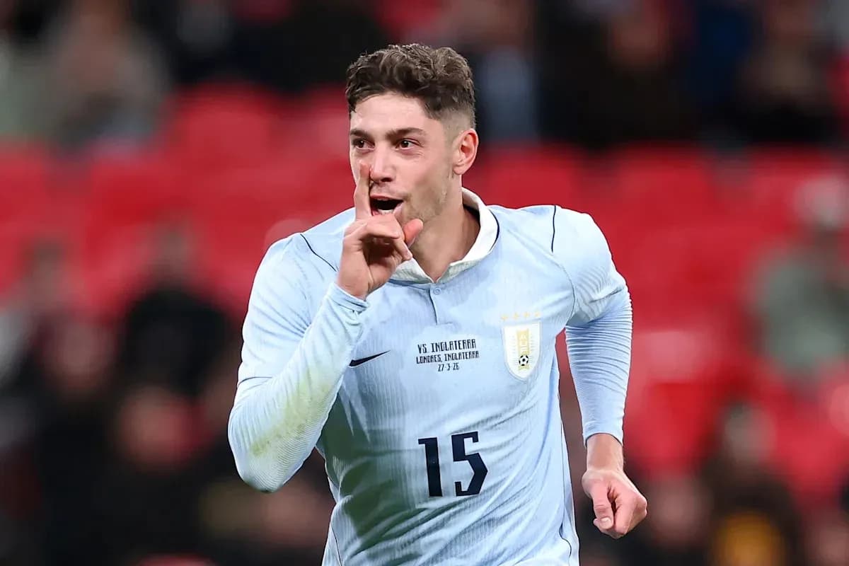 Player celebrating with a shushing gesture after scoring Player celebrating with a shushing gesture after scoring