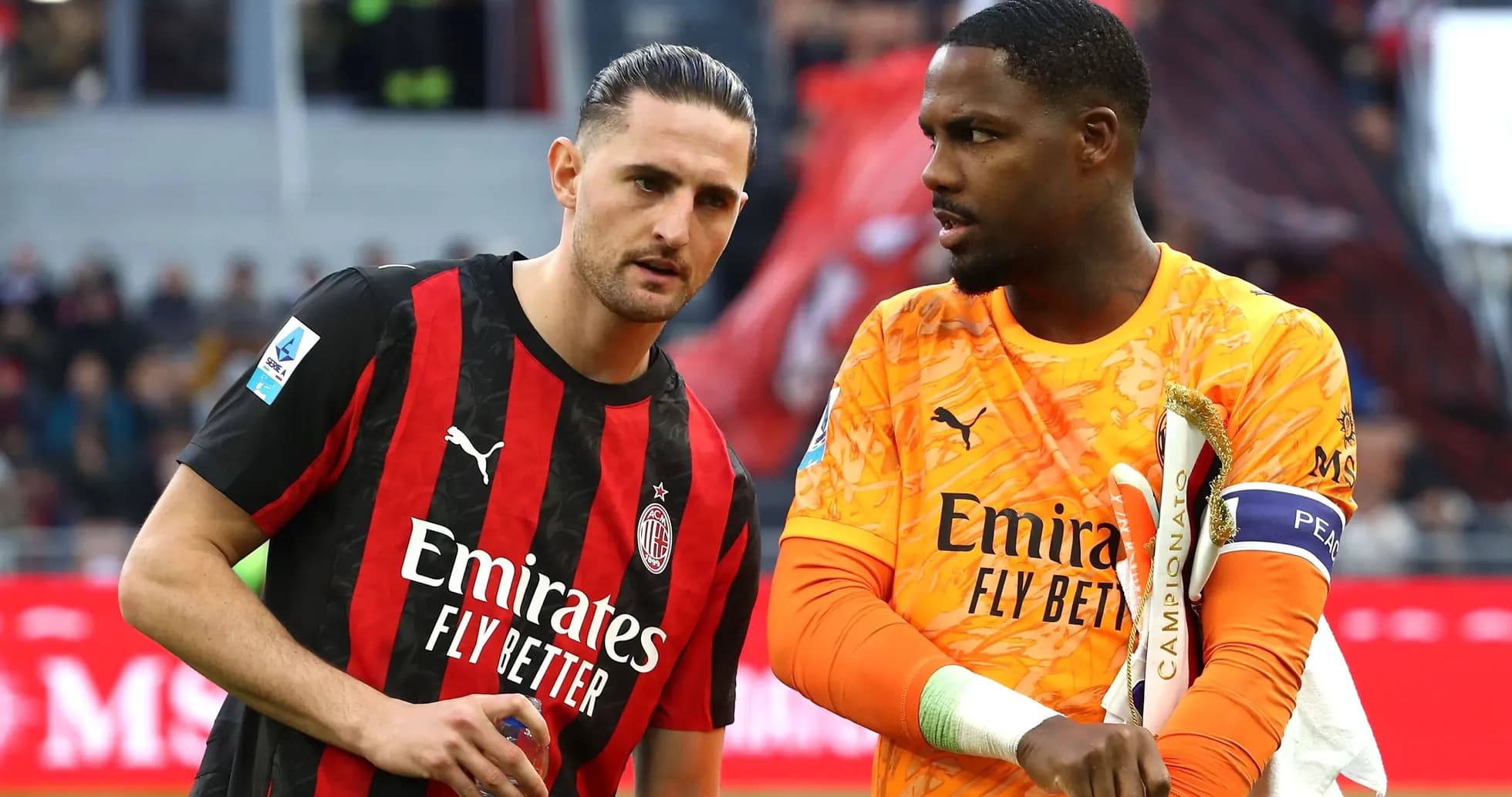 AC Milan players discussing on the pitch AC Milan players discussing on the pitch