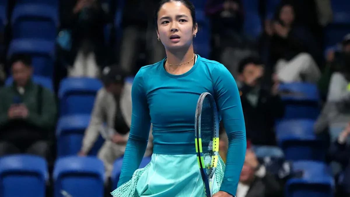 Tennis player holding racket during match Tennis player holding racket during match