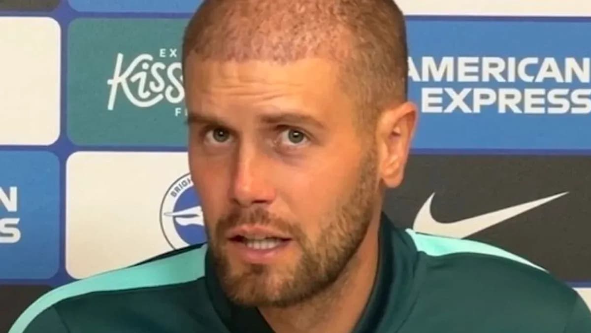 Football manager speaking at press conference podium Football manager speaking at press conference podium