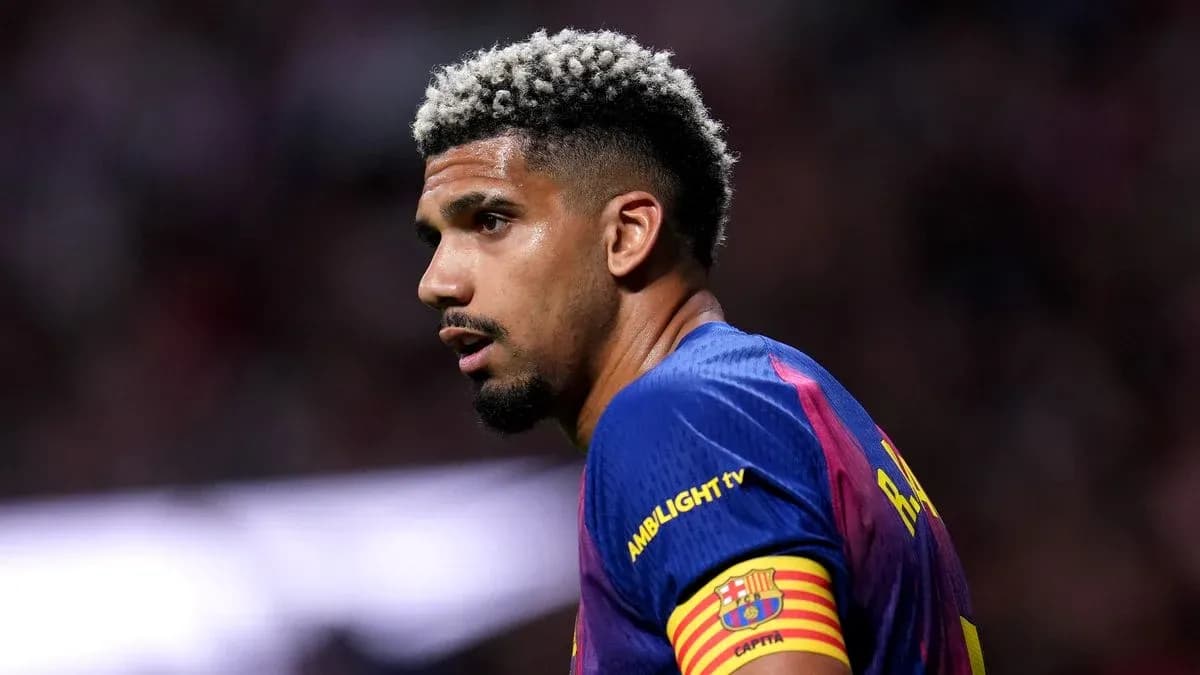 Player wearing FC Barcelona jersey on the field Player wearing FC Barcelona jersey on the field
