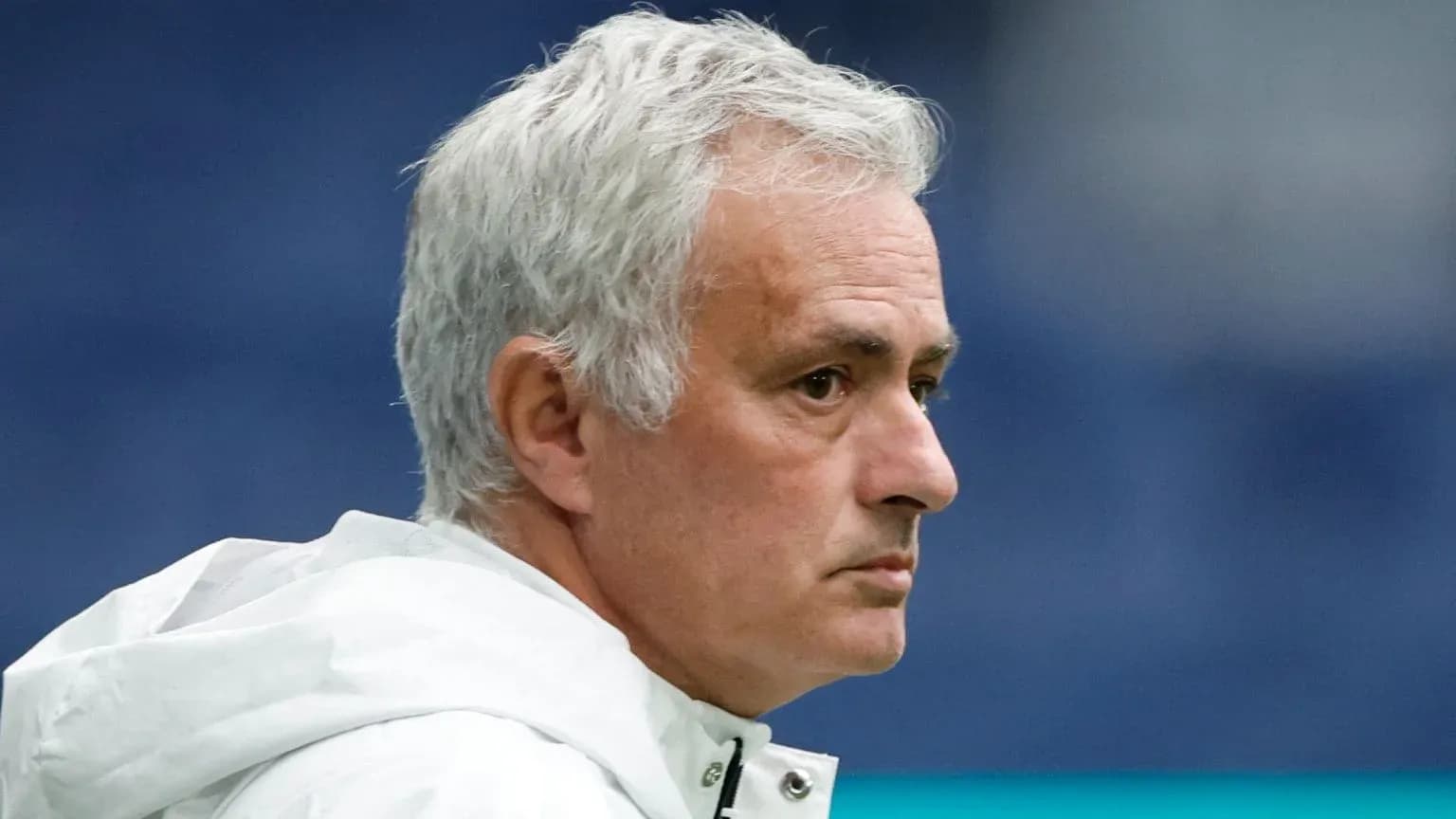 Coach with gray hair in profile view Coach with gray hair in profile view