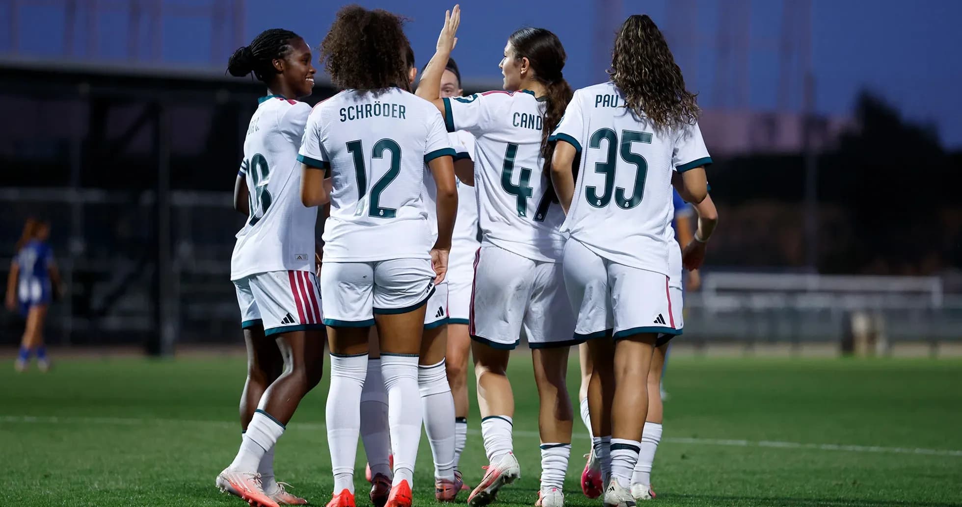Real Madrid women's team celebrating a goal Real Madrid women's team celebrating a goal