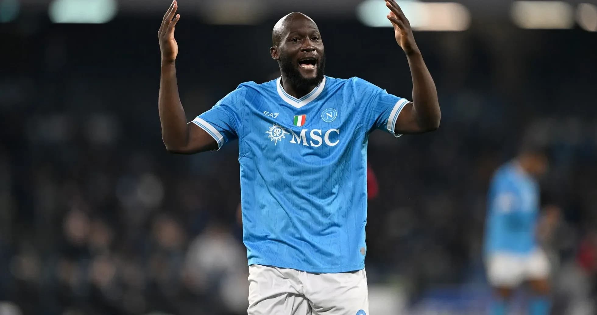 Player celebrating in Napoli home kit during match Player celebrating in Napoli home kit during match