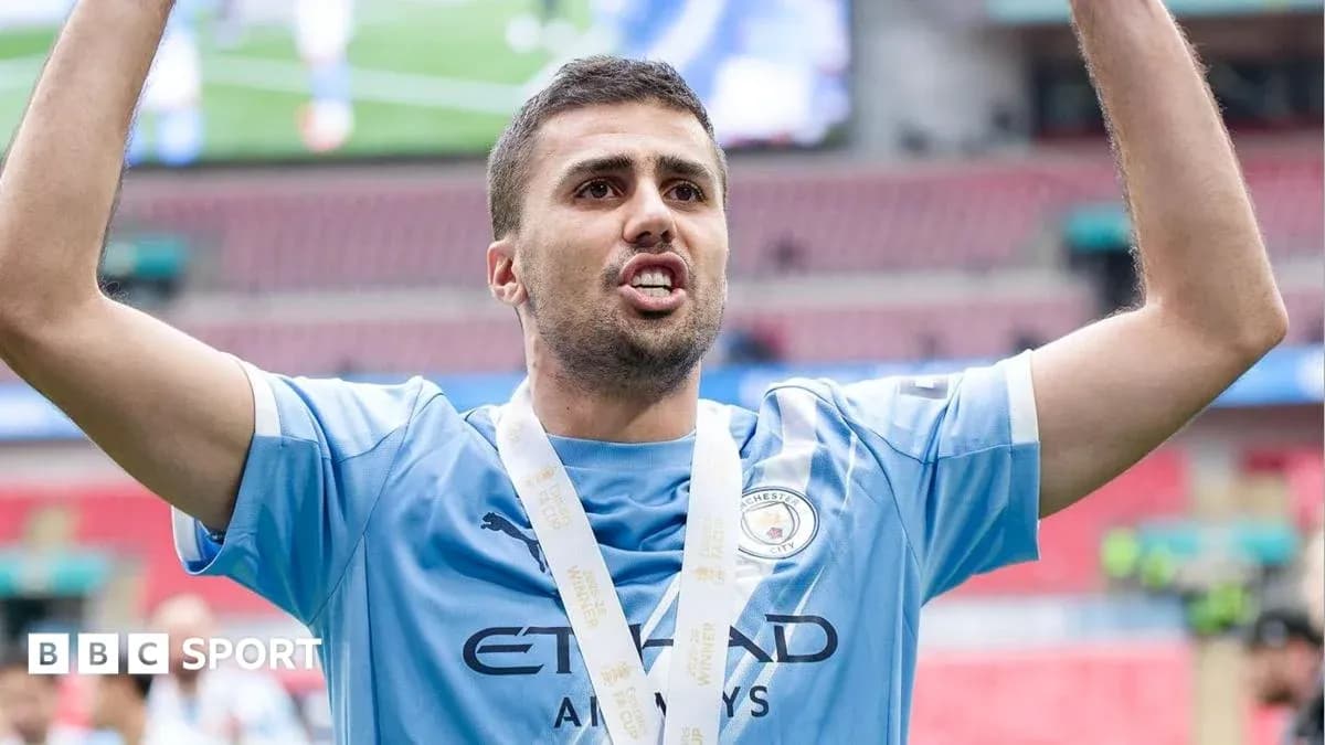 Player celebrating with medal after match victory Player celebrating with medal after match victory