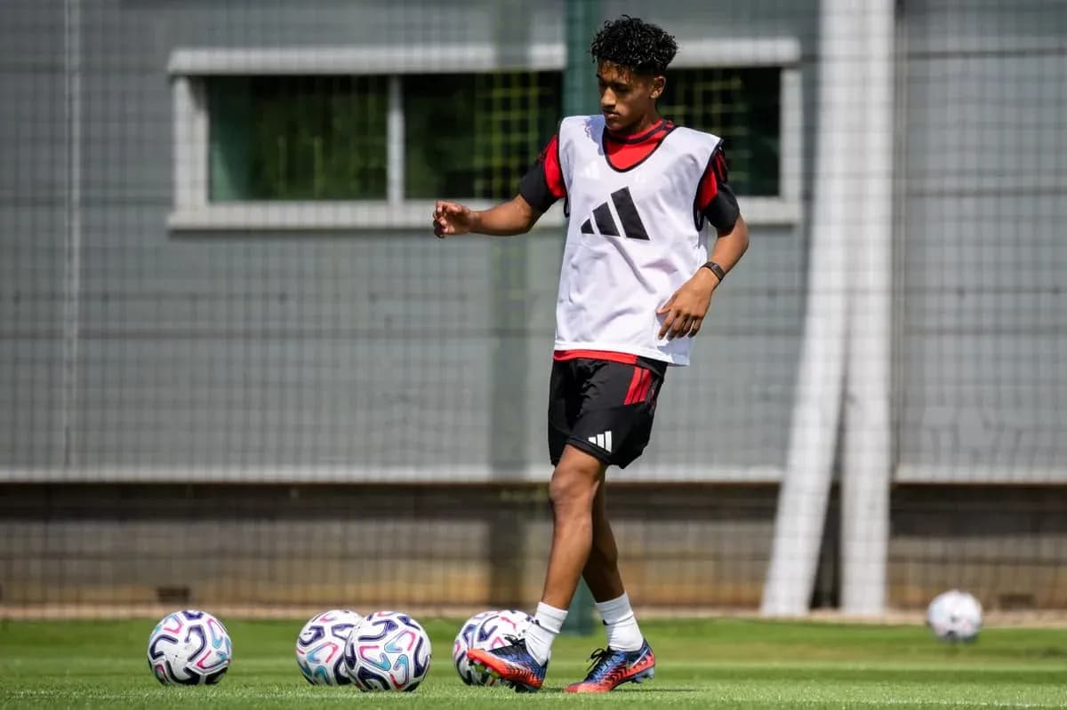 Player practicing with soccer balls on training field Player practicing with soccer balls on training field