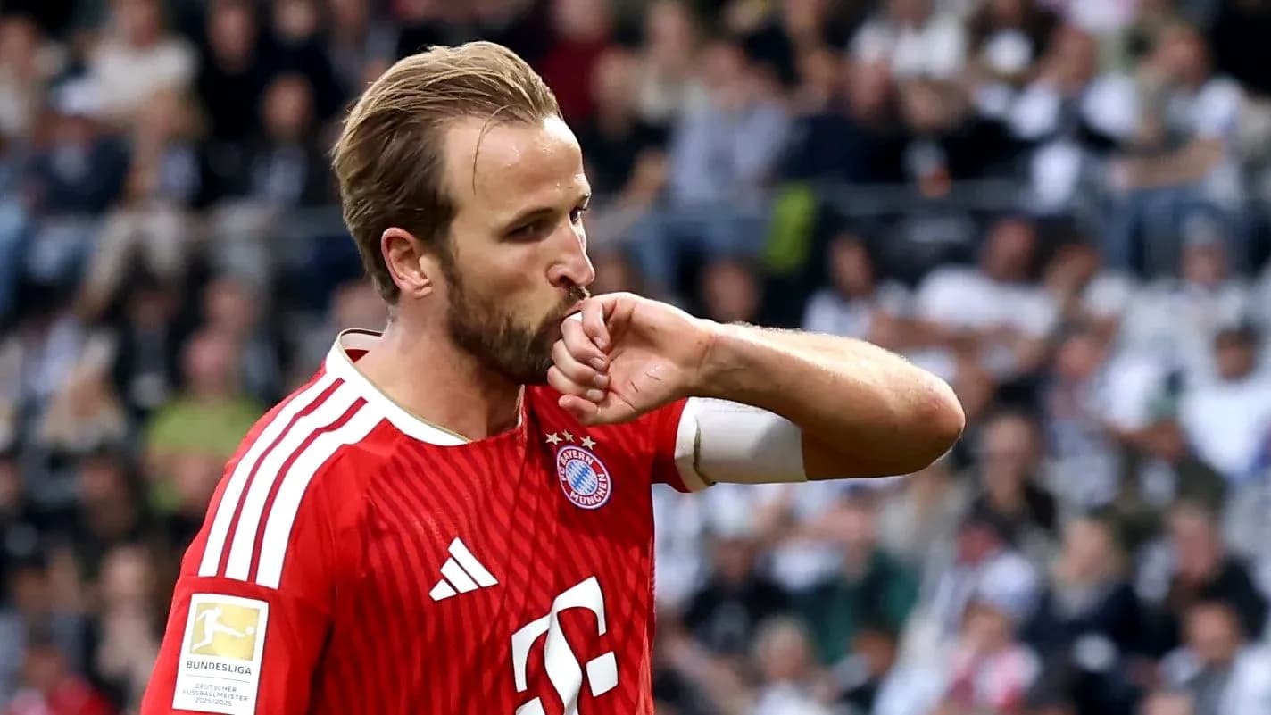 Player celebrating by kissing his wrist during match Player celebrating by kissing his wrist during match
