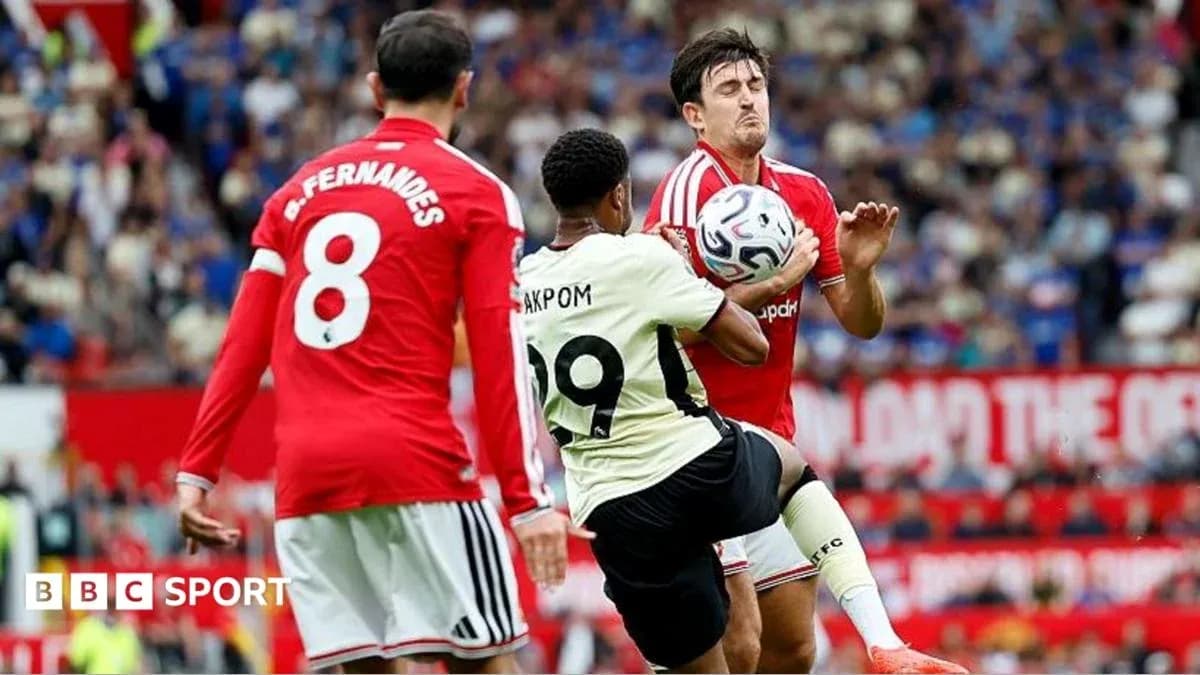 Player attempting to control ball during match action Player attempting to control ball during match action