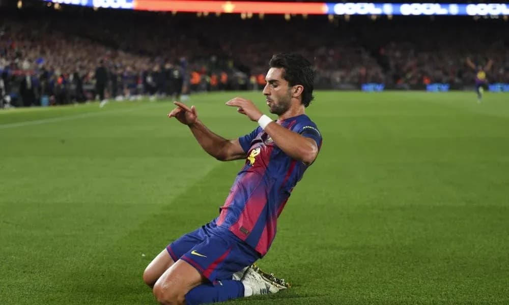 Barcelona player celebrating goal on the pitch Barcelona player celebrating goal on the pitch