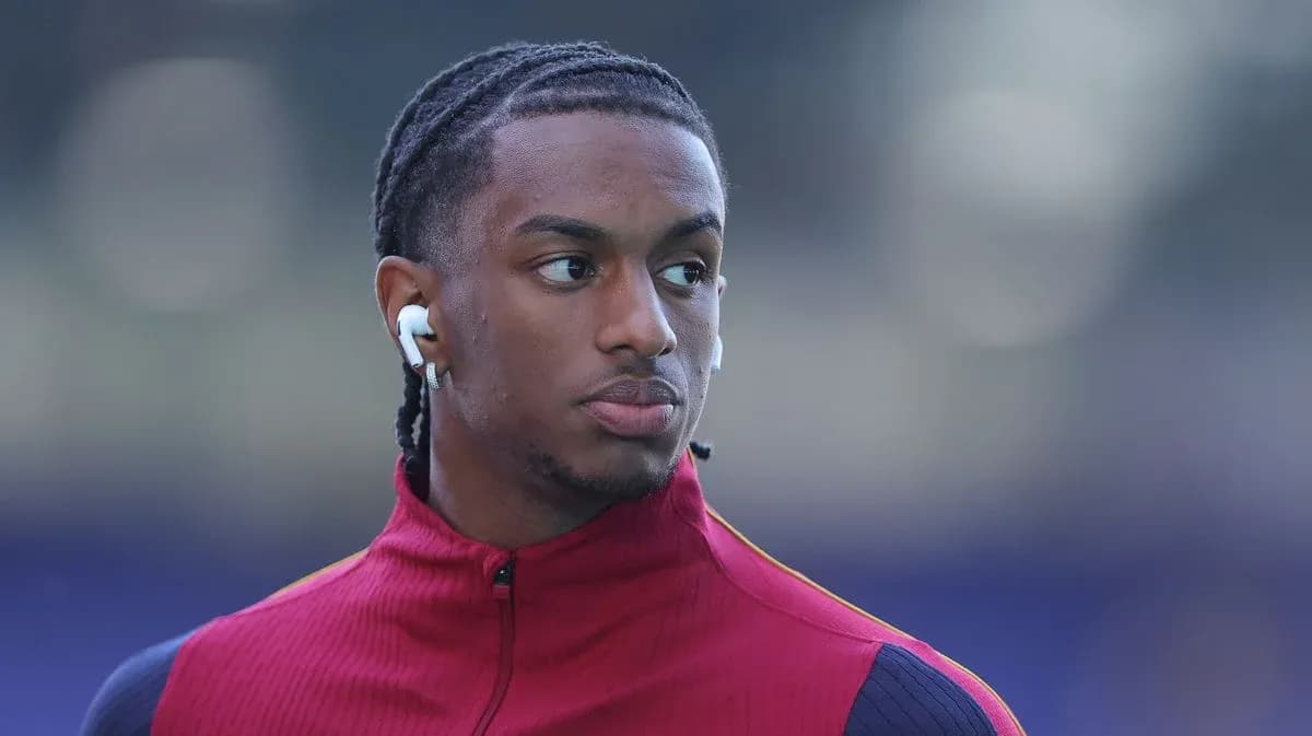 Player wearing earbuds during pre-match warm-up Player wearing earbuds during pre-match warm-up