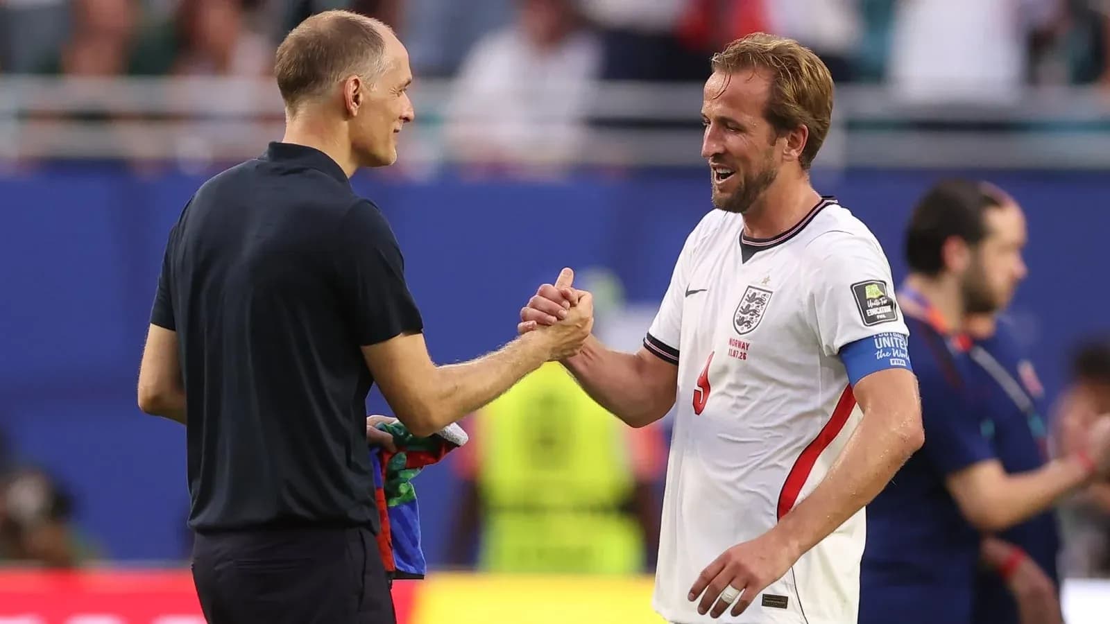 Manager and player shaking hands after match Manager and player shaking hands after match