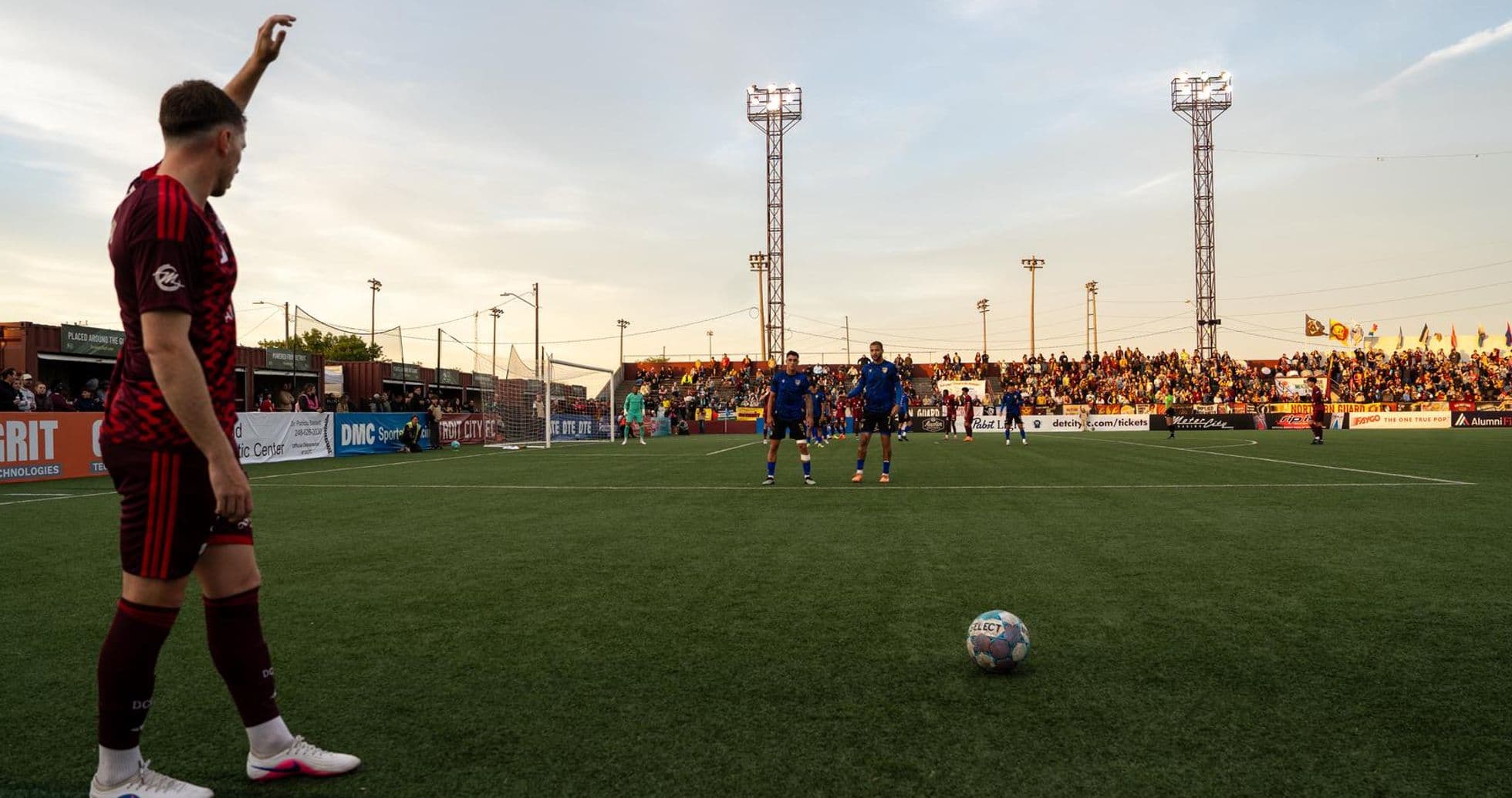 Player preparing for a free kick during match Player preparing for a free kick during match