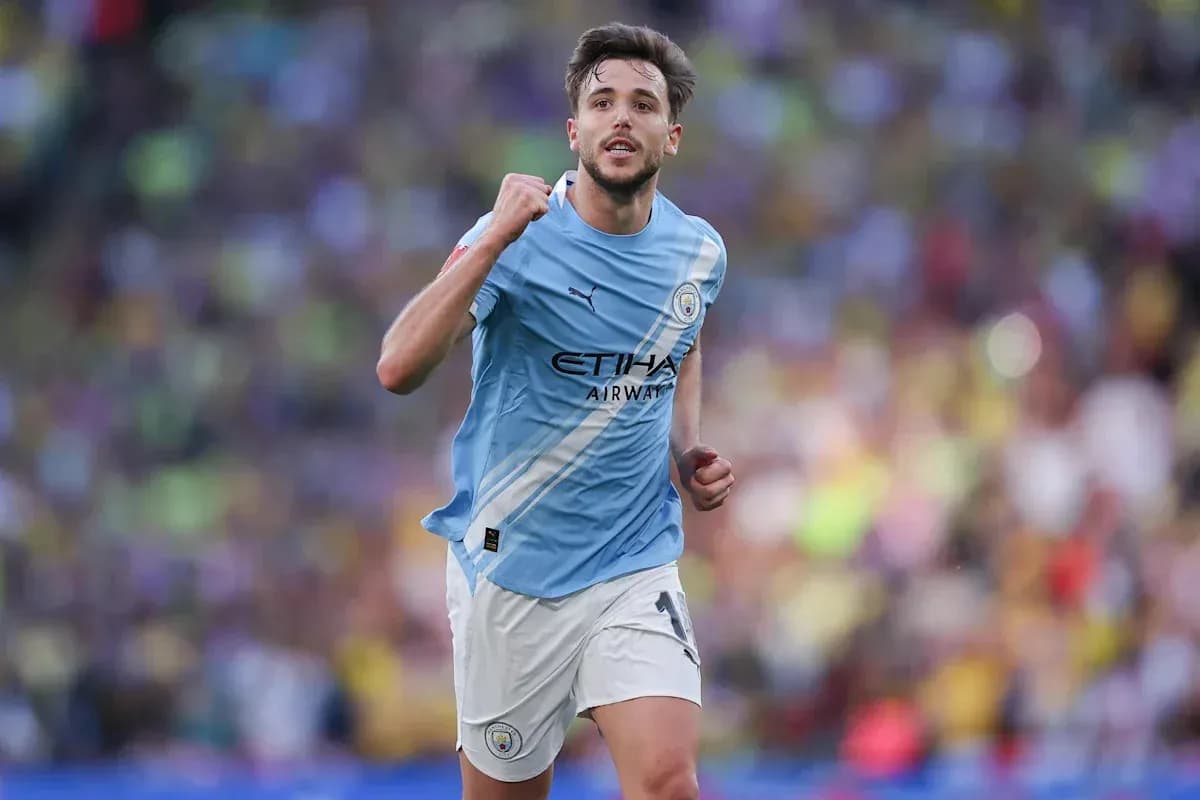 Player celebrating after scoring for Manchester City Player celebrating after scoring for Manchester City
