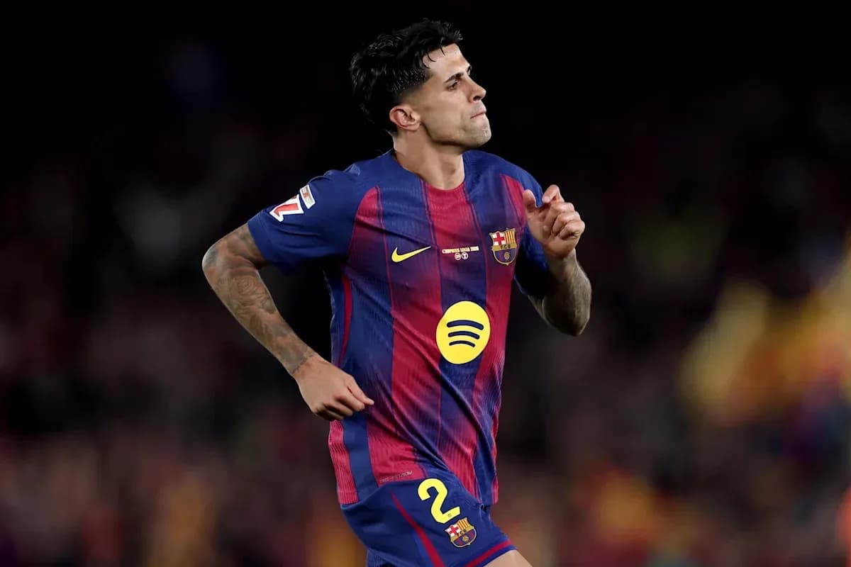 Player in Barcelona kit running on the pitch Player in Barcelona kit running on the pitch